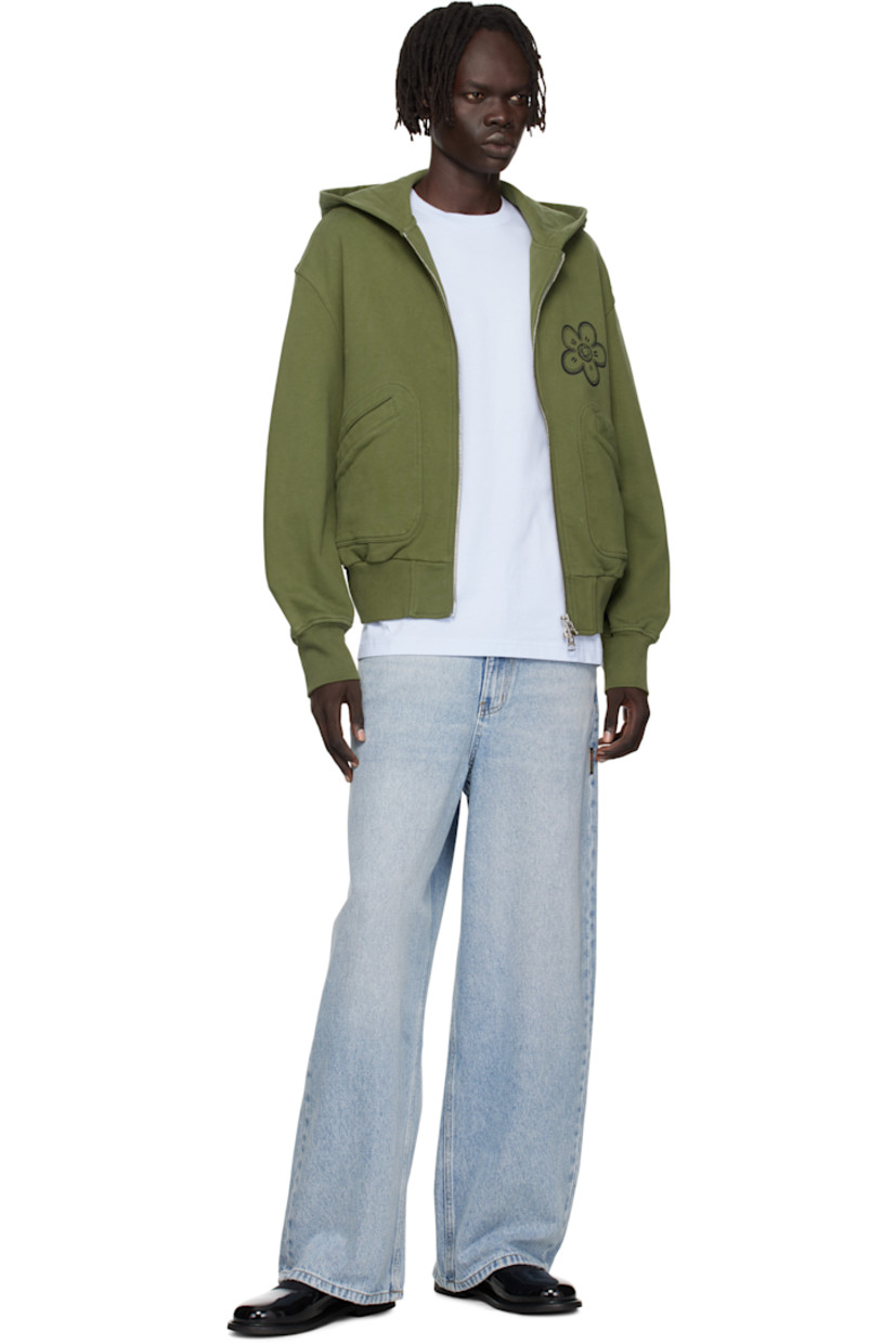 Stretch GOTS-certified organic cotton French terry hoodie.

· Two-way zip closure
· Logo printed at chest and back
· Patch pockets at front
· Rib-knit hem and cuffs
· Text printed at back

Part of the Kenzo x Futura 2000 collaboration.
 
Supplier color: Khaki