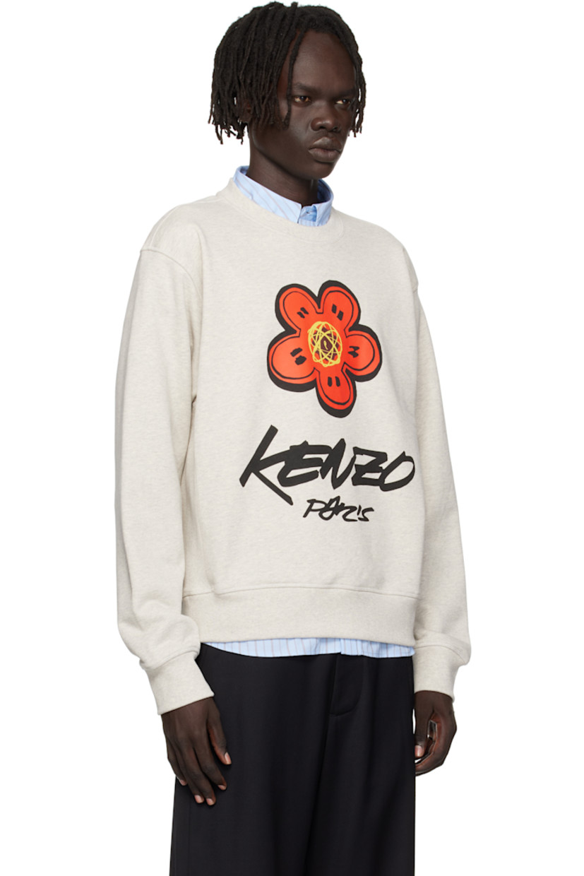 GOTS-certified organic cotton French terry sweatshirt.

· Rib-knit crewneck, hem, and cuffs 
· Logo printed at front
· Logo patch at back collar
· Text printed at back

Part of the Kenzo x Futura 2000 collaboration.
 
Supplier color: Pale grey