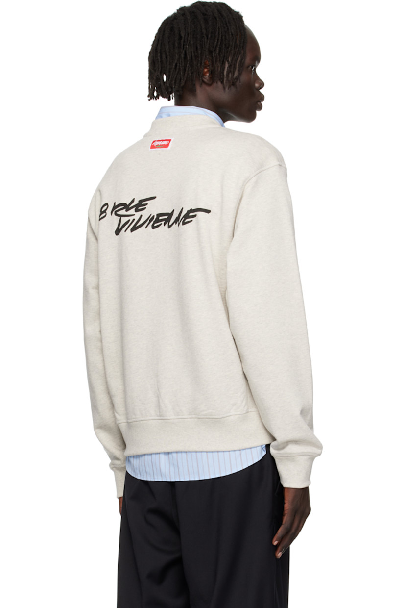 GOTS-certified organic cotton French terry sweatshirt.

· Rib-knit crewneck, hem, and cuffs 
· Logo printed at front
· Logo patch at back collar
· Text printed at back

Part of the Kenzo x Futura 2000 collaboration.
 
Supplier color: Pale grey