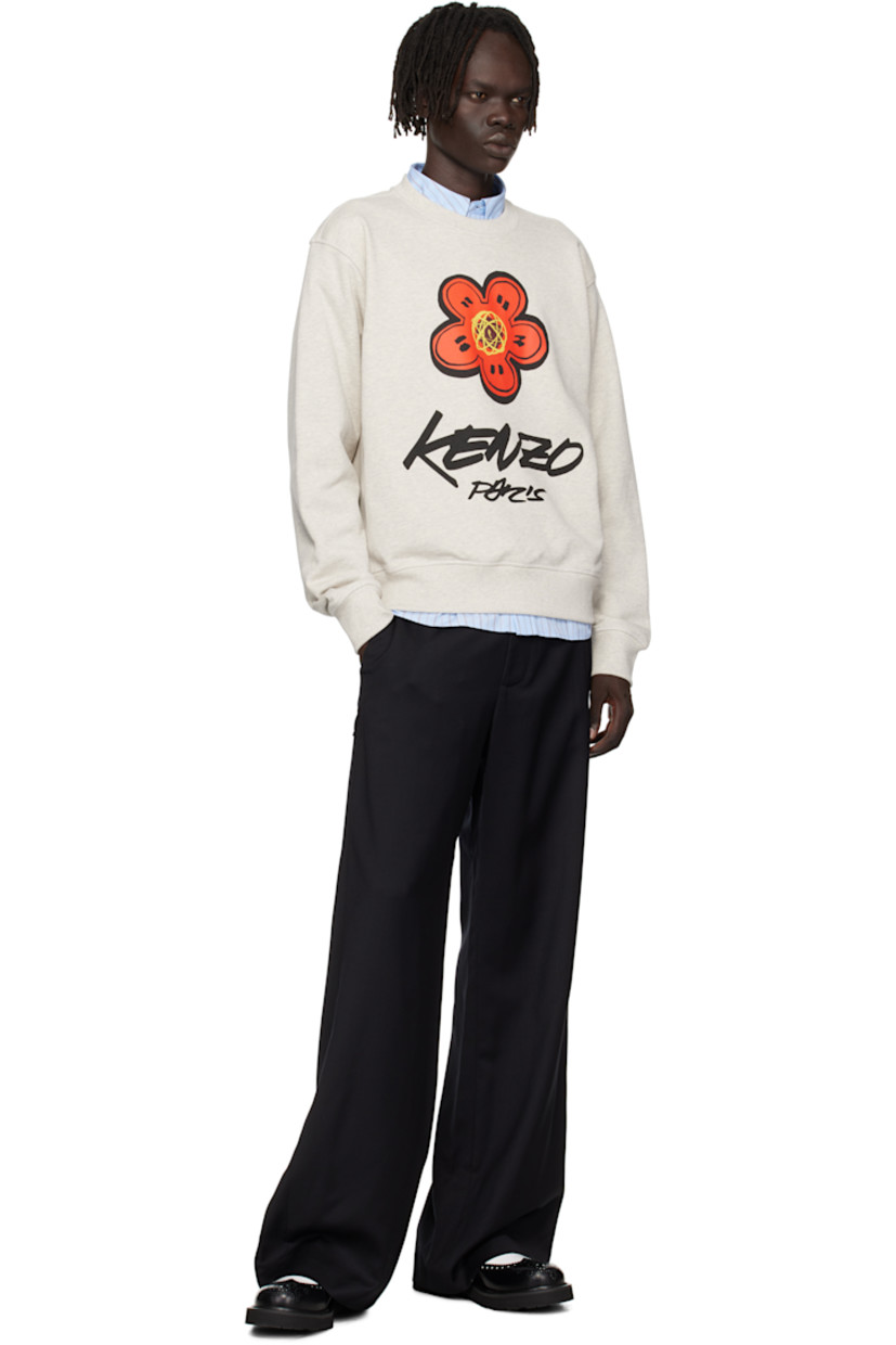 GOTS-certified organic cotton French terry sweatshirt.

· Rib-knit crewneck, hem, and cuffs 
· Logo printed at front
· Logo patch at back collar
· Text printed at back

Part of the Kenzo x Futura 2000 collaboration.
 
Supplier color: Pale grey