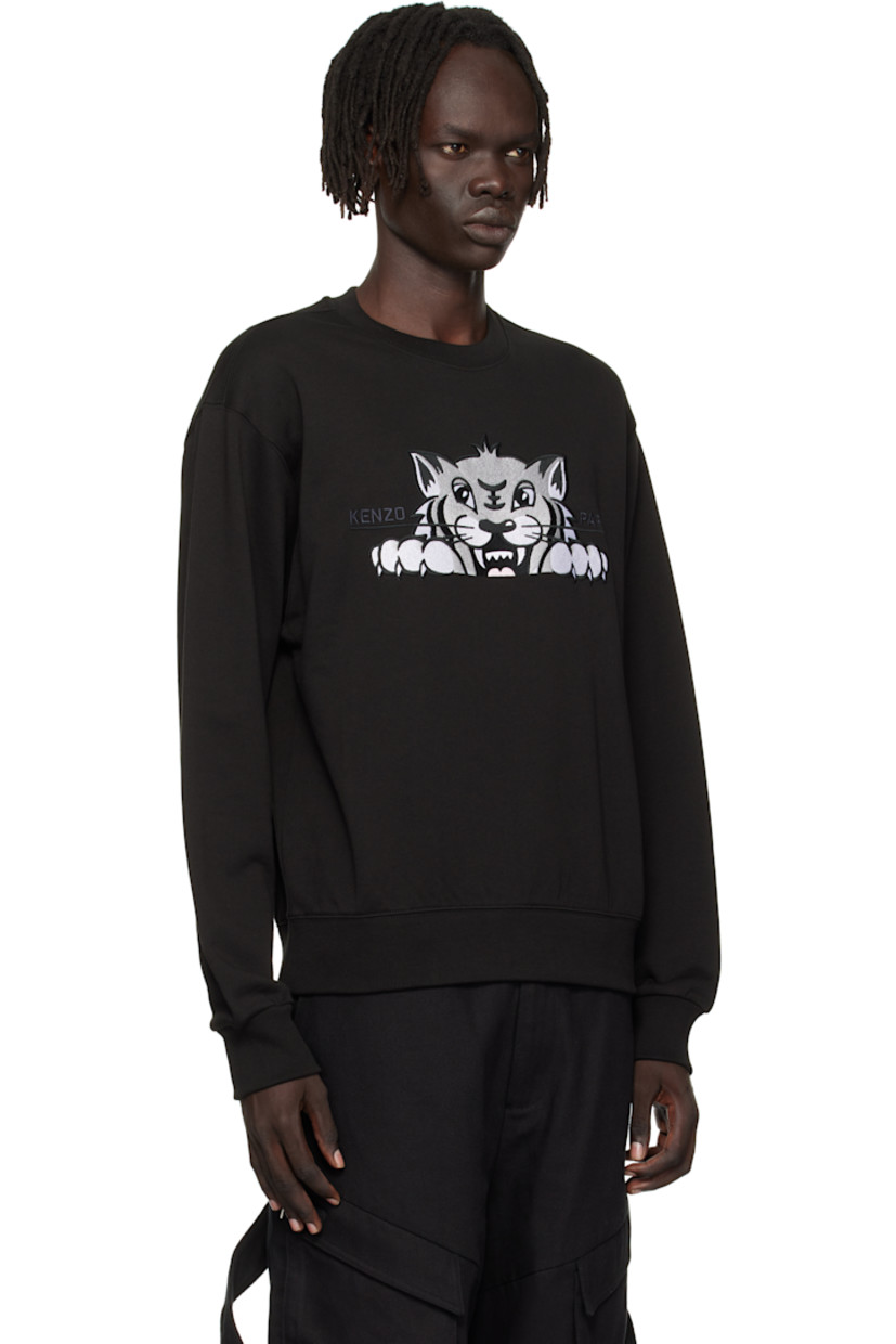 GOTS-certified organic cotton French terry sweatshirt.

· Rib-knit crewneck, hem, and cuffs 
· Logo graphic embroidered at chest

Supplier color: Black