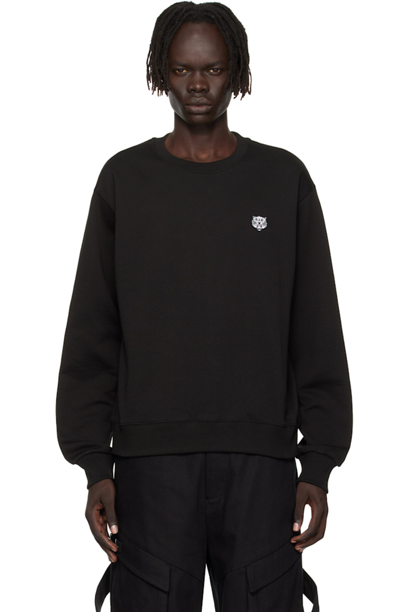 GOTS-certified organic cotton French terry sweatshirt.

· Rib-knit crewneck, hem, and cuffs 
· Embroidered graphic patch at chest
· Logo embroidered at back collar

Supplier color: Black