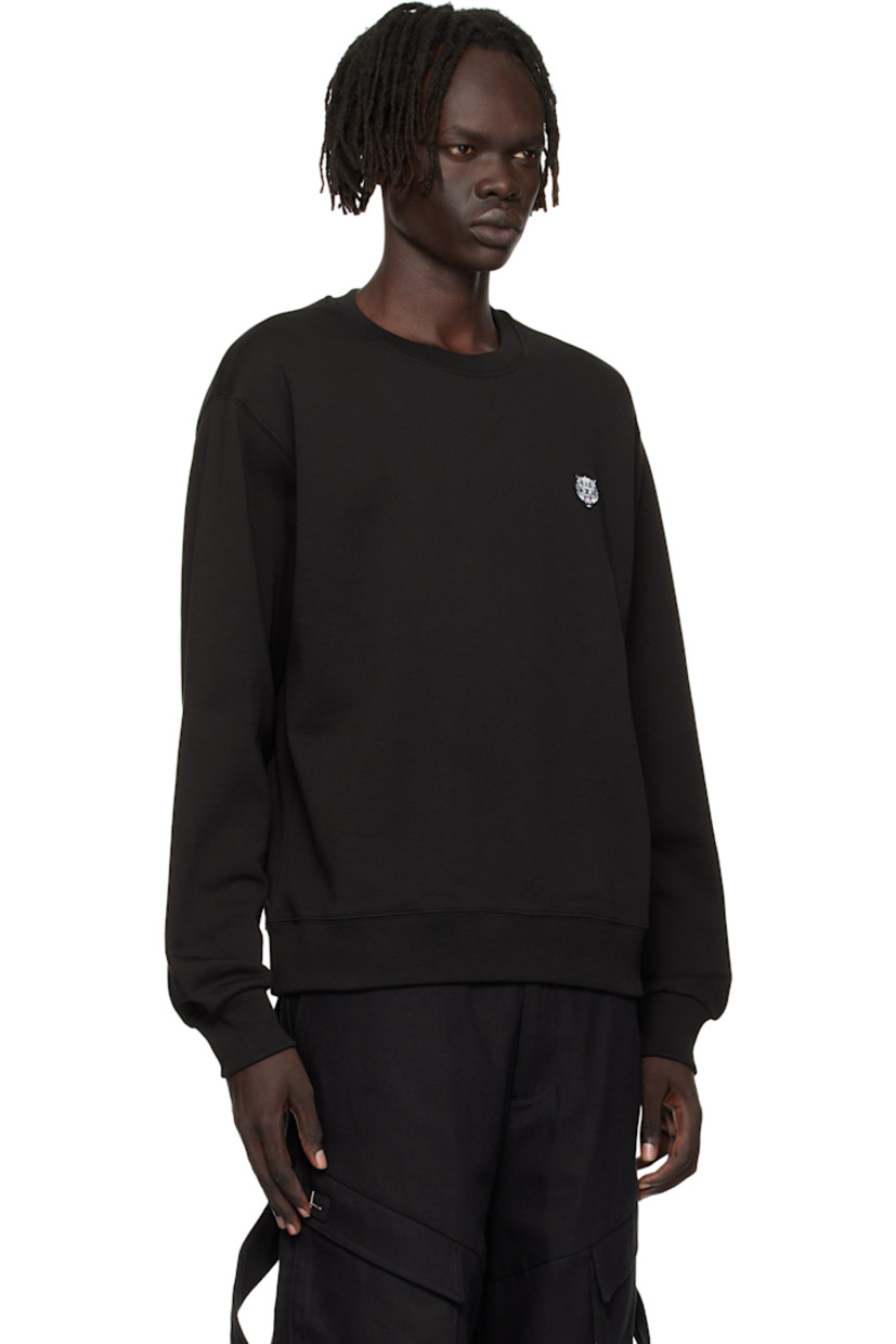 GOTS-certified organic cotton French terry sweatshirt.

· Rib-knit crewneck, hem, and cuffs 
· Embroidered graphic patch at chest
· Logo embroidered at back collar

Supplier color: Black