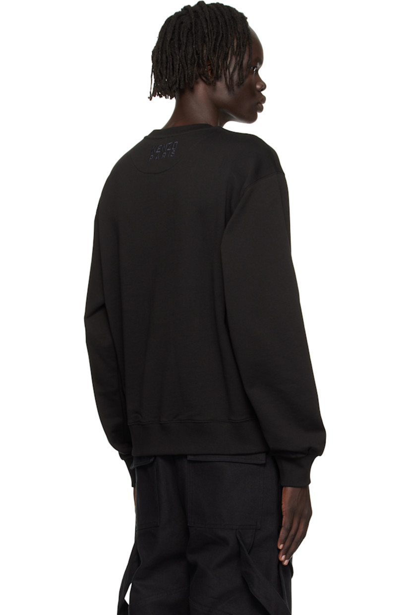 GOTS-certified organic cotton French terry sweatshirt.

· Rib-knit crewneck, hem, and cuffs 
· Embroidered graphic patch at chest
· Logo embroidered at back collar

Supplier color: Black