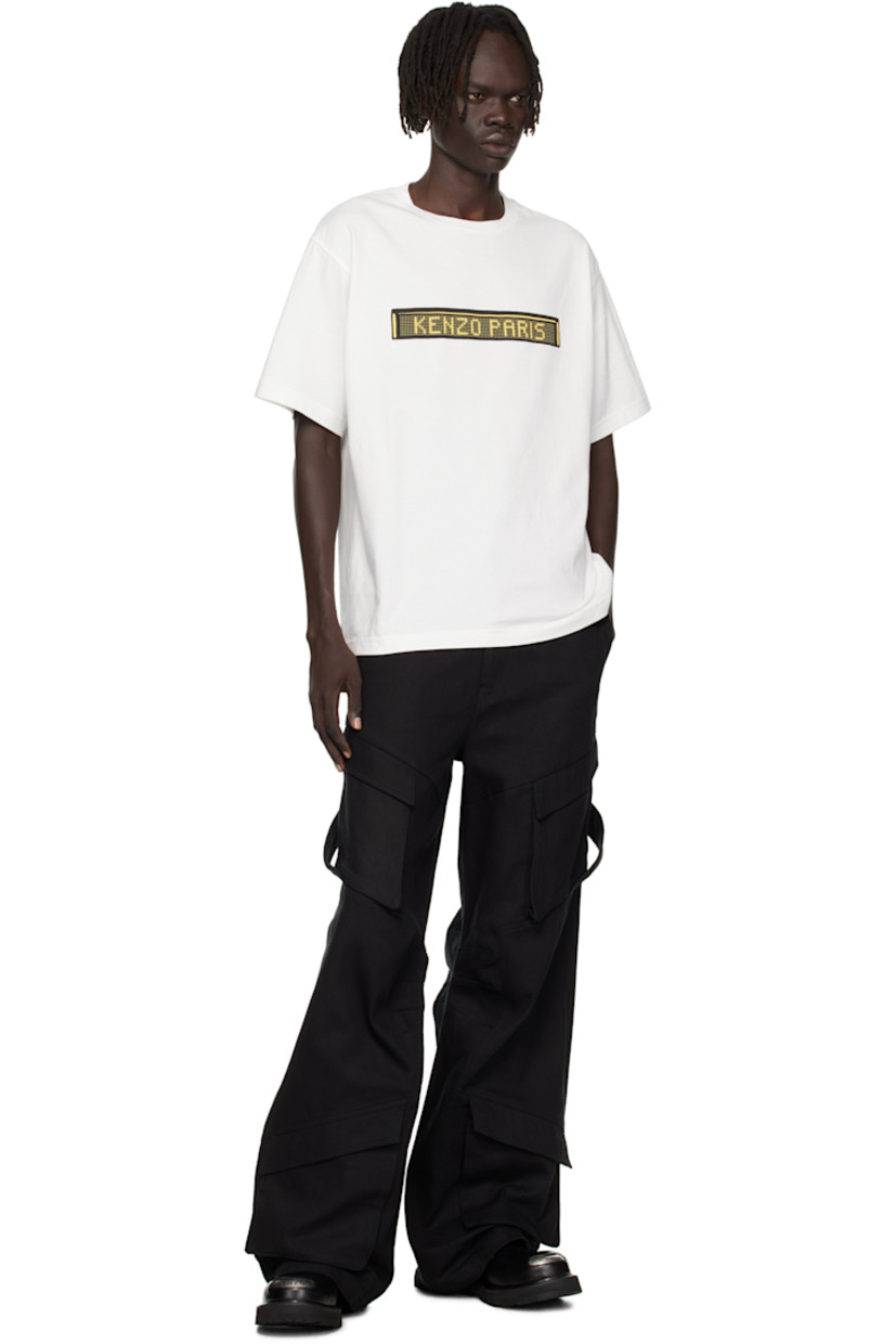 GOTS-certified organic cotton jersey T-shirt.

· Rib-knit crewneck
· Logo printed at chest
· Graphic printed at back

Supplier color: Off white