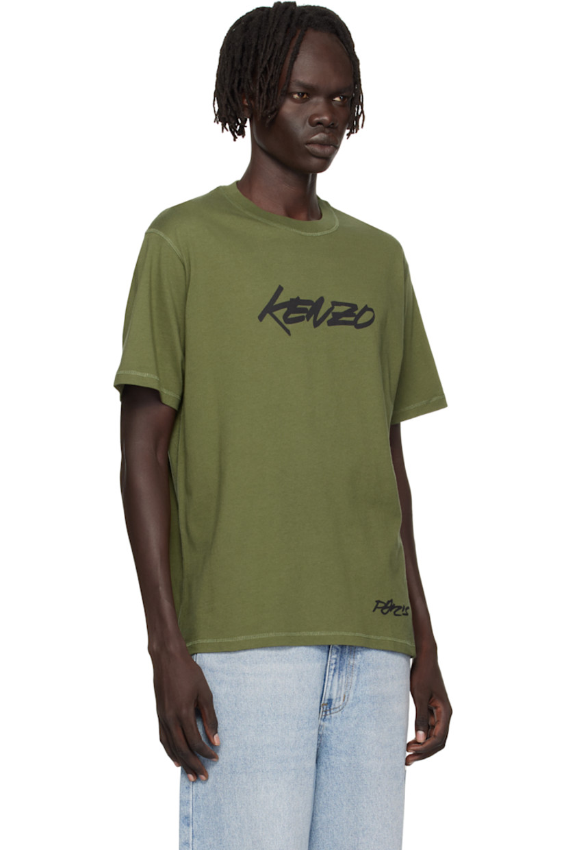 GOTS-certified organic cotton jersey T-shirt.

· Rib-knit crewneck
· Logo printed at front
· Text printed at front and back
· Logo patch at back collar

Part of the Kenzo x Futura 2000 collaboration.

Supplier color: Khaki