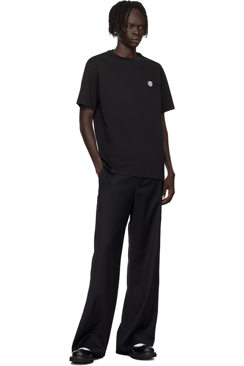 GOTS-certified organic cotton jersey T-shirt.

· Rib-knit crewneck
· Embroidered graphic patch at chest
· Logo embroidered at back collar

Supplier color: Black