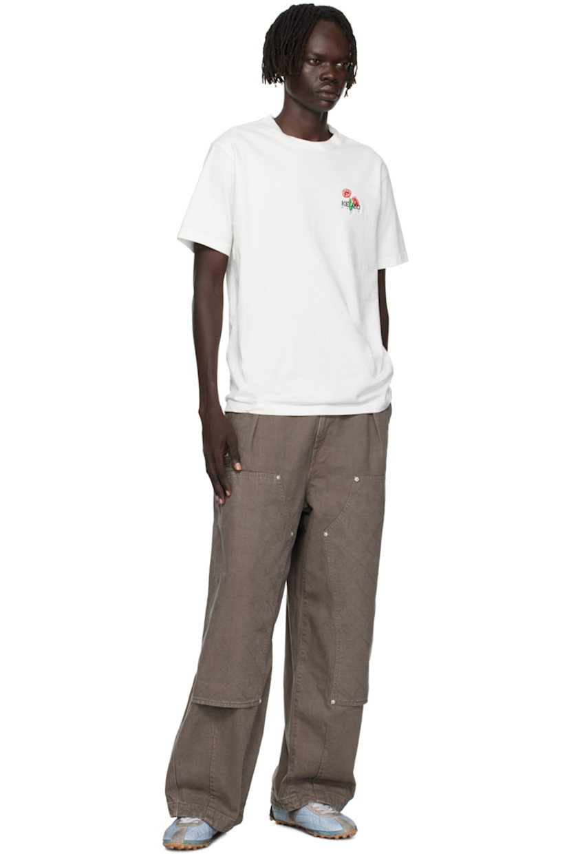 Organic cotton jersey T-shirt.

· GOTS-certified
· Rib-knit crewneck
· Logo graphic embroidered at chest

Supplier color: Off white
