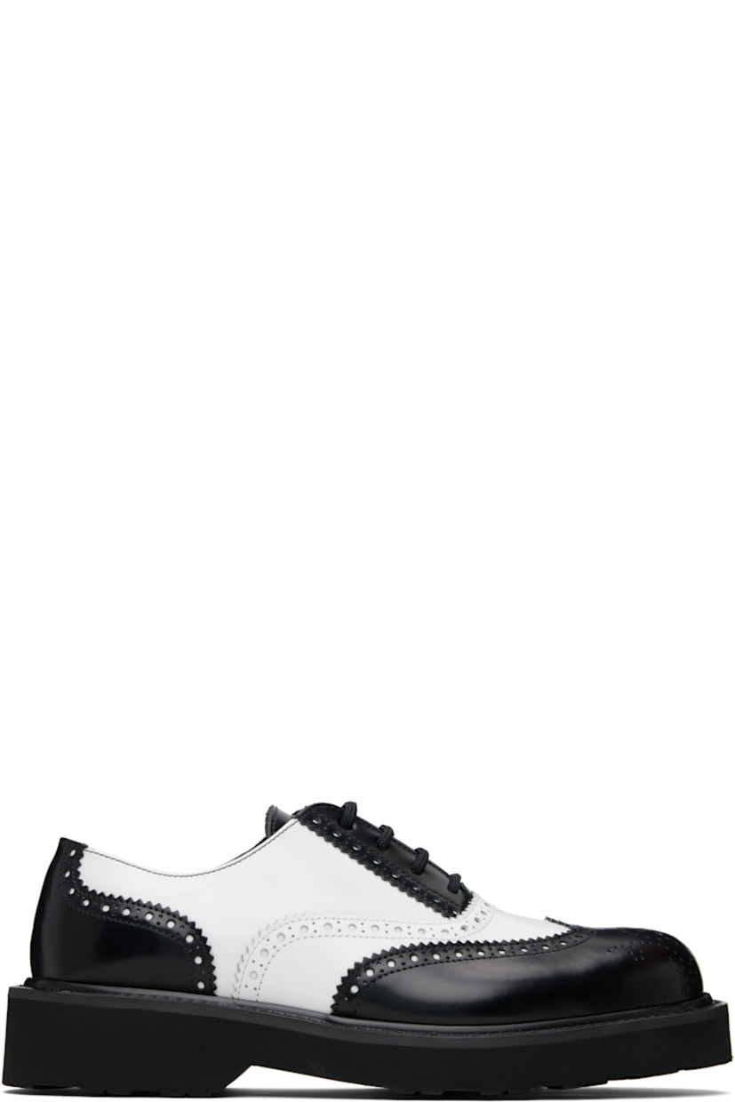 Polished calfskin oxfords. 

· Perforations and serrated edges throughout 
· Lace-up closure
· Logo hardware at tongue
· Grained leather lining
· Foam rubber midsole
· Treaded rubber sole
· Heel: H1.5"

Supplier color: White