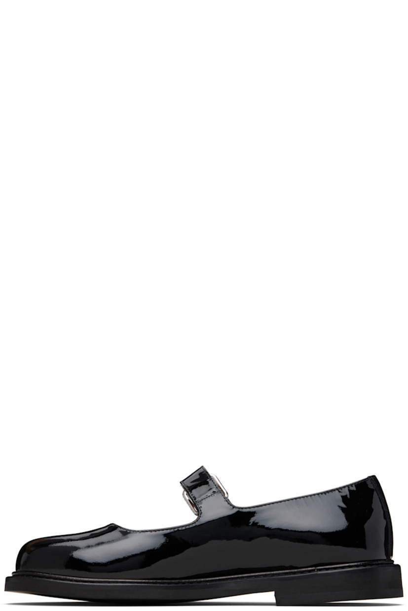 Patent calfskin mary jane-style loafers.

· Pin-buckle strap at vamp
· Logo hardware at outer side
· Leather lining
· Rubber sole
· Logo-engraved silver-tone hardware

Supplier color: Black