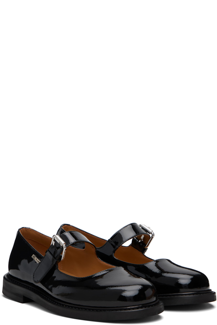 Patent calfskin mary jane-style loafers.

· Pin-buckle strap at vamp
· Logo hardware at outer side
· Leather lining
· Rubber sole
· Logo-engraved silver-tone hardware

Supplier color: Black