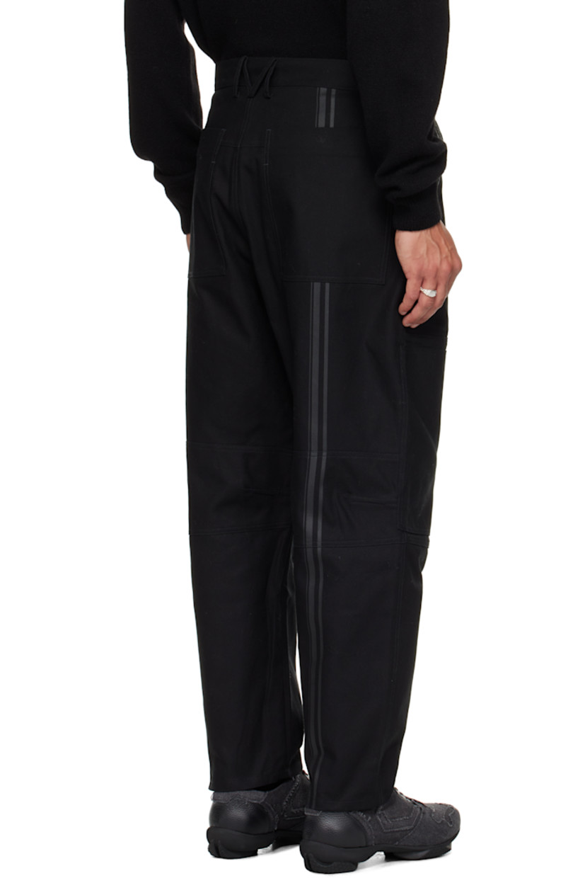 Cotton canvas jeans.

· Paneled construction
· Belt loops
· Four-pocket styling
· Zip fly
· Logo belt loops at back
· Stripes printed at back leg 

Supplier color: Black
