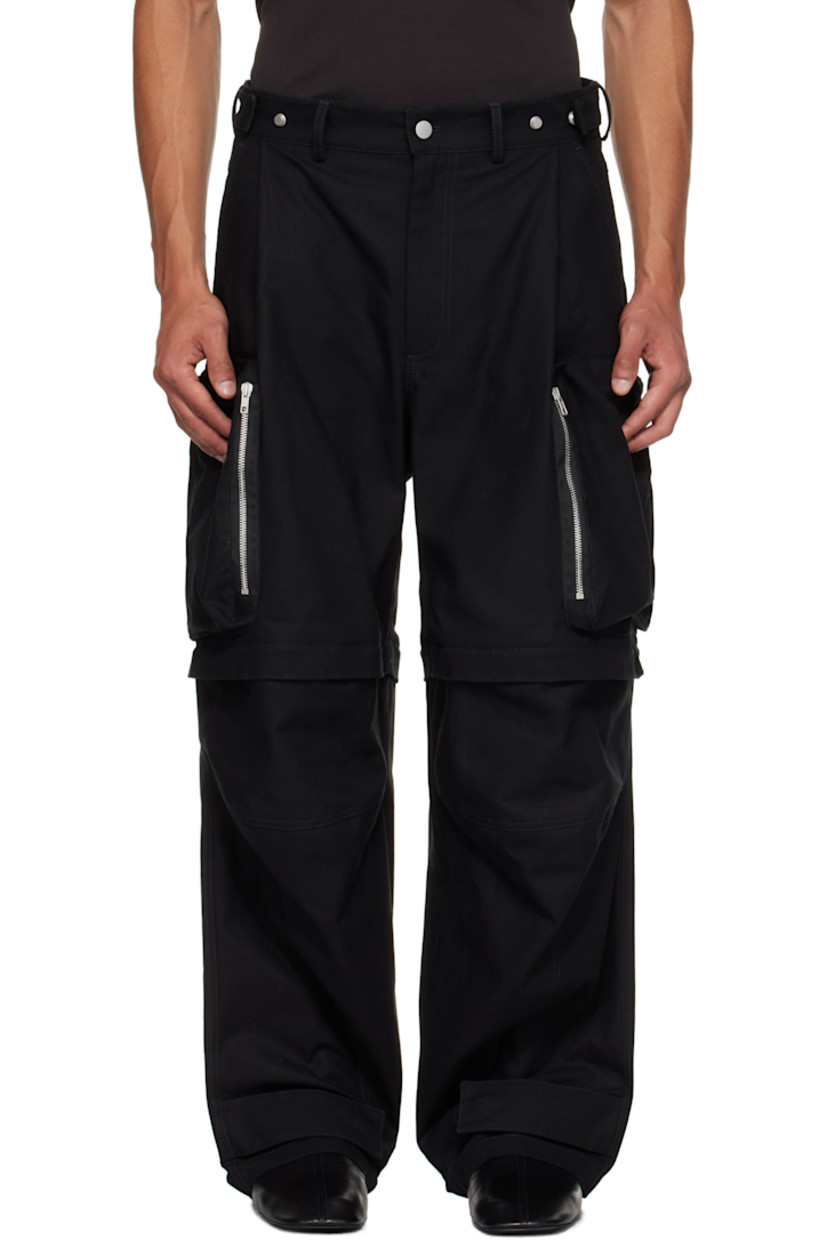 Cotton canvas cargo pants.

· Belt loops
· Adjustable press-stud tabs at waistband and hem
· Four-pocket styling
· Zip fly
· Pleats at waist
· Zip fastening at knees for shorts styling
· Zip cargo pocket at outseams
· Logo belt loops at back

Supplier color: Black
