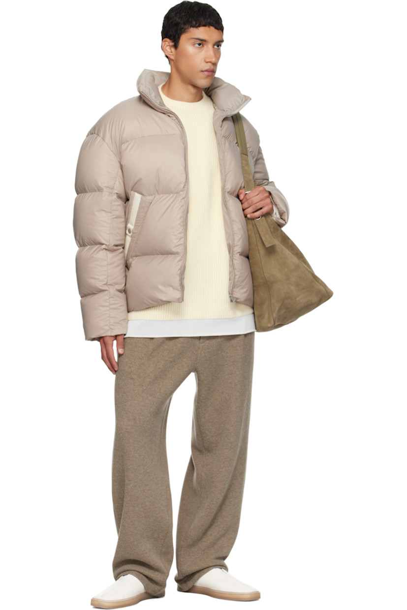 Knit wool- and cashmere-blend trousers.

· Two-pocket styling
· Zip fly 
· Pleats at front 

Supplier color: Mud
