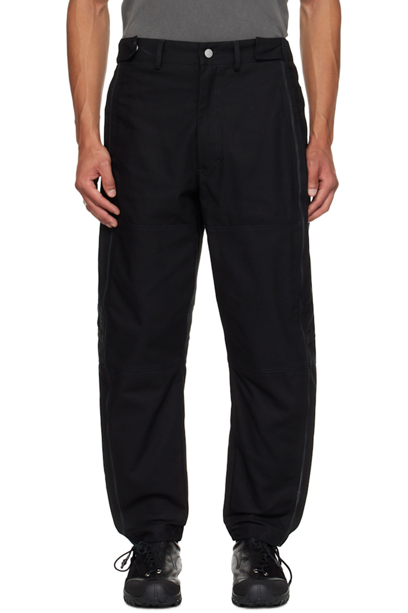 Cotton canvas trousers.

· Belt loops
· Press-stud tabs at waistband 
· Four-pocket styling
· Zip fly
· Zip expansion panel at outseams 
· Stripes printed at back

Supplier color: Black