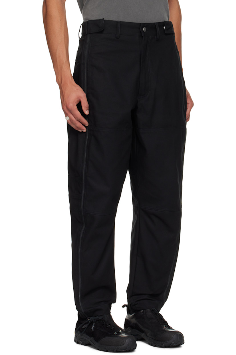 Cotton canvas trousers.

· Belt loops
· Press-stud tabs at waistband 
· Four-pocket styling
· Zip fly
· Zip expansion panel at outseams 
· Stripes printed at back

Supplier color: Black