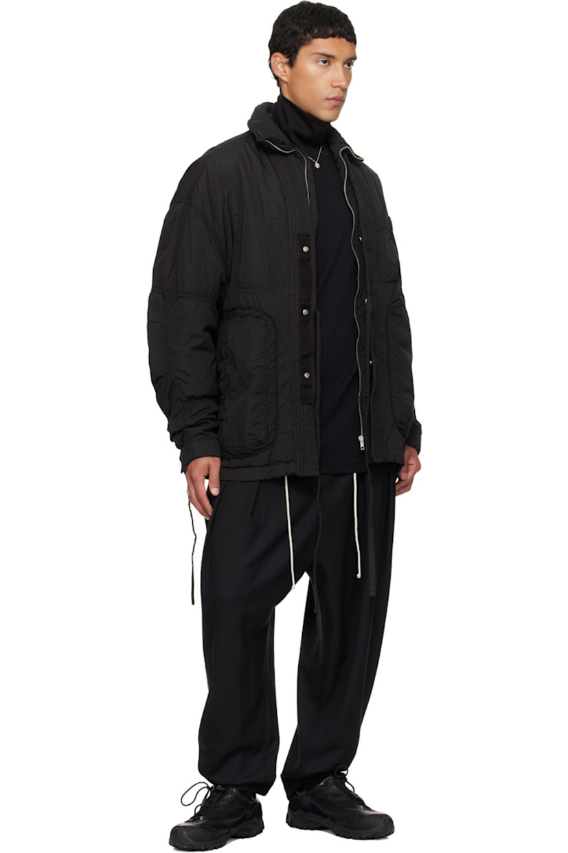 Virgin wool barathea trousers.

· Belt loops at elasticized waistband
· Two-pocket styling
· Mock fly
· Drawstring at waist
· Pleats at front
· Topstitching at cuffs
· Stripes printed at back leg

Supplier color: Black
