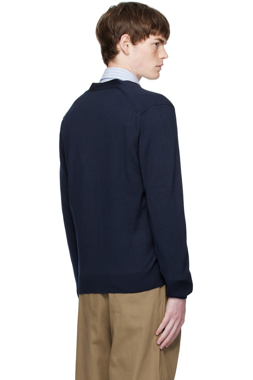 Knit wool cardigan.

· V-neck
· Button closure
· Logo patch embroidered at chest
· Rib-knit cuffs and hem
· Patch pockets at waist

Supplier color: Classic Navy