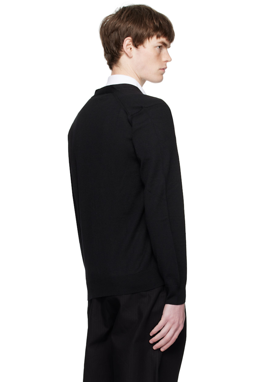 Knit wool cardigan.

· V-neck
· Button closure
· Logo patch embroidered at chest
· Rib-knit cuffs and hem
· Patch pockets at waist

Supplier color: Black