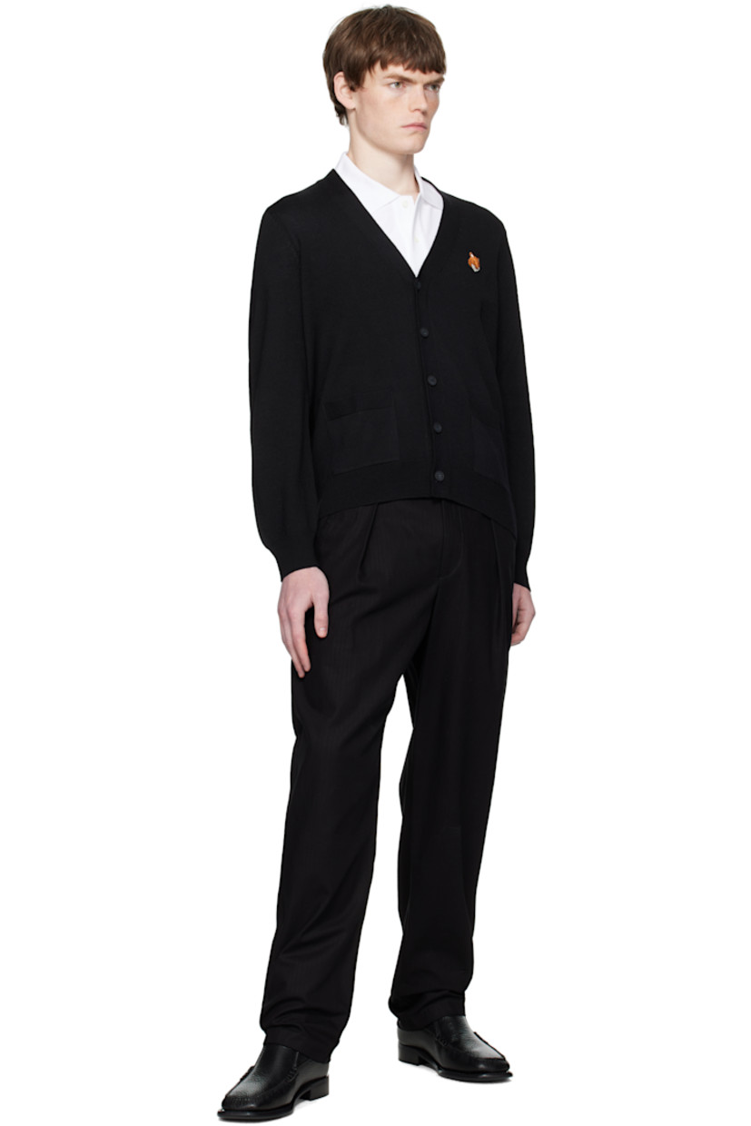 Knit wool cardigan.

· V-neck
· Button closure
· Logo patch embroidered at chest
· Rib-knit cuffs and hem
· Patch pockets at waist

Supplier color: Black