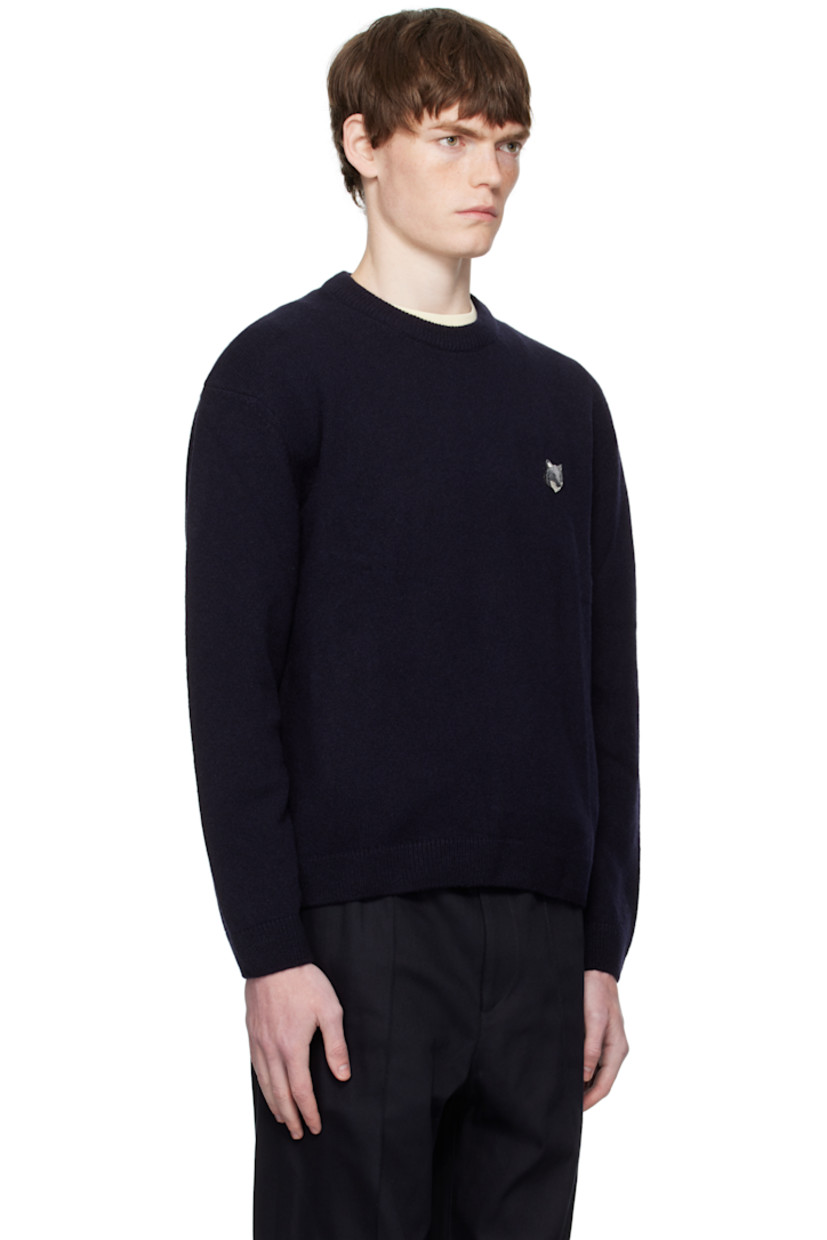 Knit lambswool sweater.

· Rib-knit crewneck, cuffs, and hem
· Logo patch embroidered at chest 

 Supplier color: Classic Navy