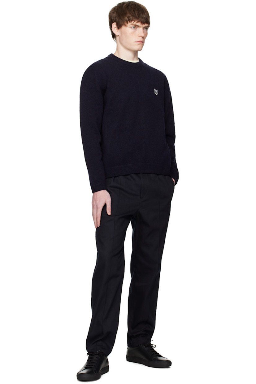 Knit lambswool sweater.

· Rib-knit crewneck, cuffs, and hem
· Logo patch embroidered at chest 

 Supplier color: Classic Navy