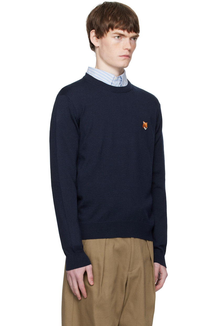Knit wool sweater.

· Rib-knit crewneck, cuffs, and hem
· Logo patch embroidered at chest

Supplier color:  Classic Navy