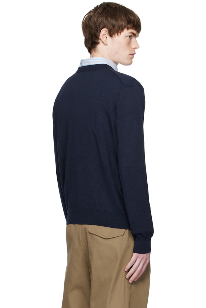 Knit wool sweater.

· Rib-knit crewneck, cuffs, and hem
· Logo patch embroidered at chest

Supplier color:  Classic Navy