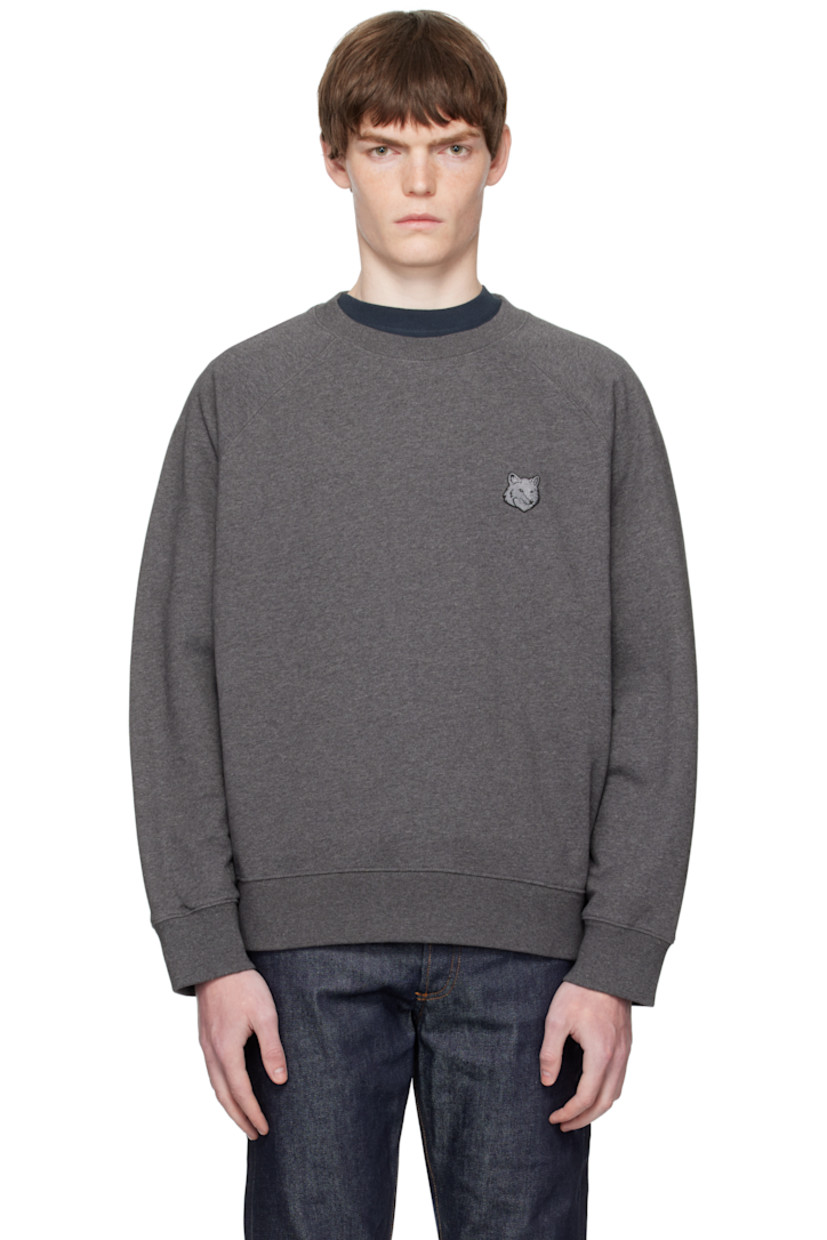 Cotton French terry sweatshirt.

· Rib-knit crewneck, cuffs, and hem
· Logo patch embroidered at chest
· Raglan sleeves

Supplier color: Dark Grey melange