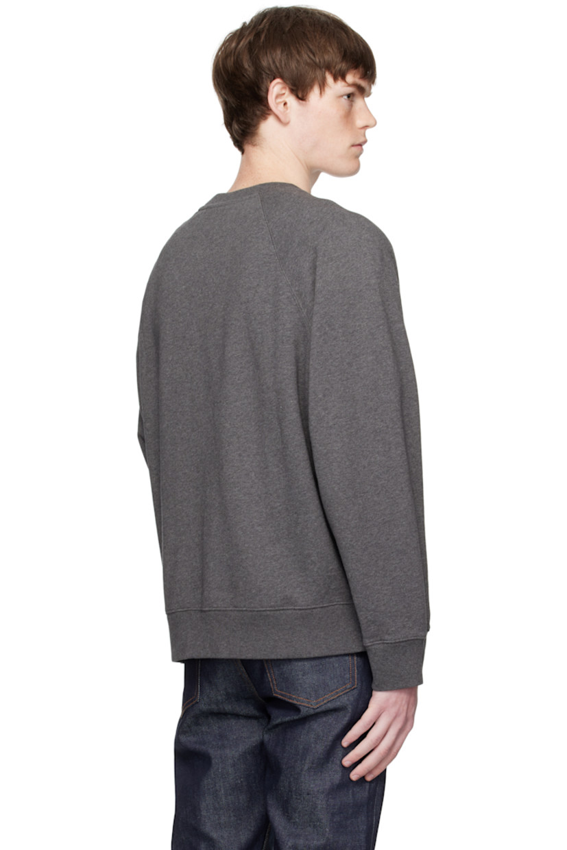 Cotton French terry sweatshirt.

· Rib-knit crewneck, cuffs, and hem
· Logo patch embroidered at chest
· Raglan sleeves

Supplier color: Dark Grey melange