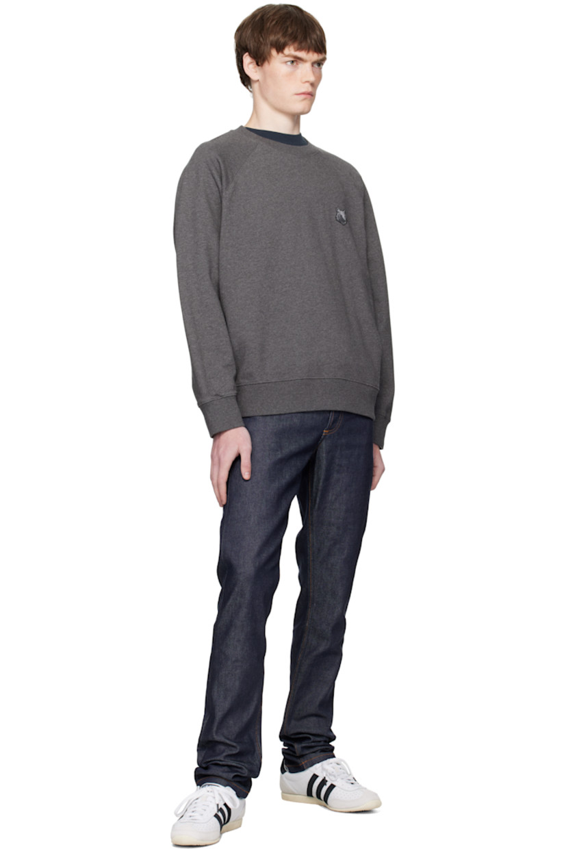 Cotton French terry sweatshirt.

· Rib-knit crewneck, cuffs, and hem
· Logo patch embroidered at chest
· Raglan sleeves

Supplier color: Dark Grey melange