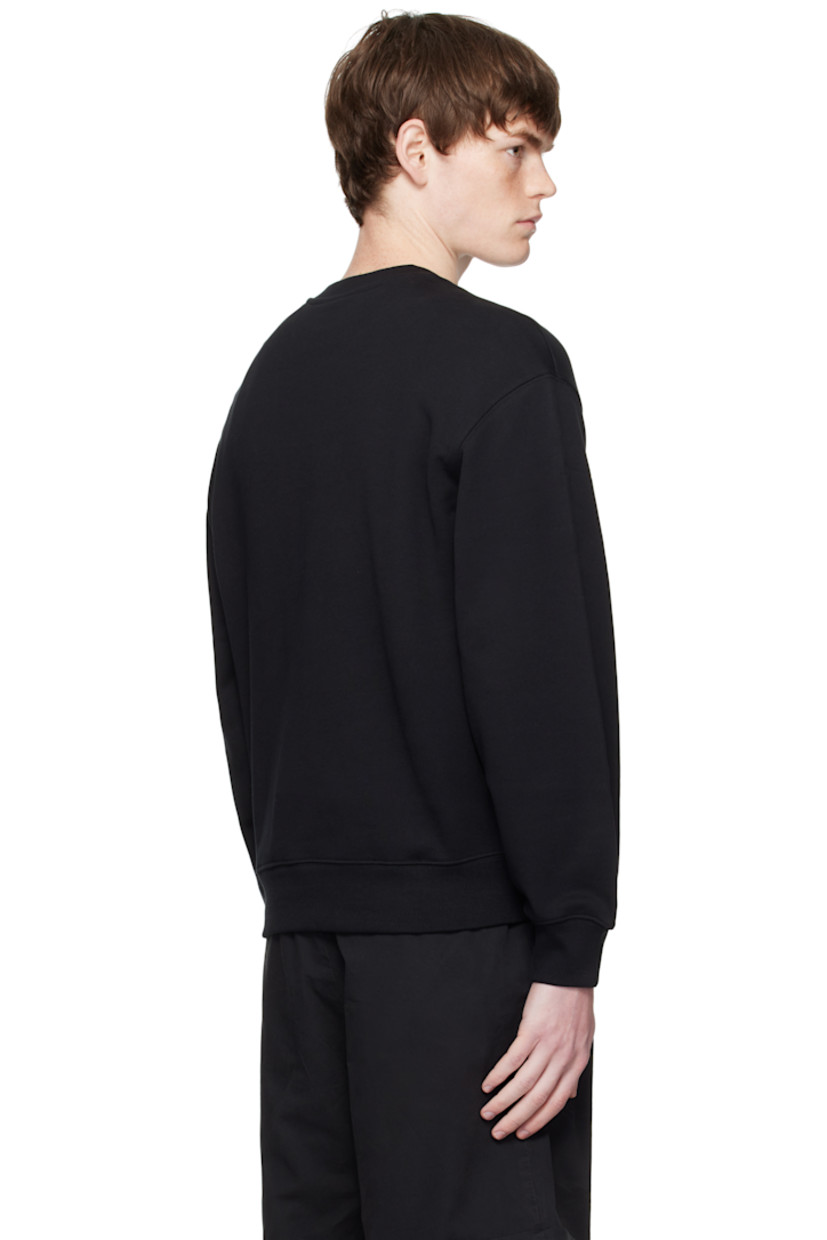 Cotton French terry sweatshirt.

· Rib-knit crewneck, cuffs, and hem
· Logo patch embroidered at chest

Supplier color: Black