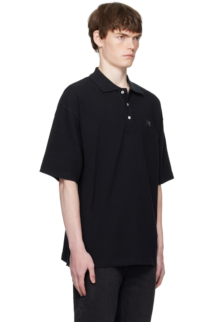 Cotton piqué polo.

· Rib-knit spread collar
· Three-button placket
· Logo patch embroidered at chest
· Tennis-tail hem

Supplier color: Black