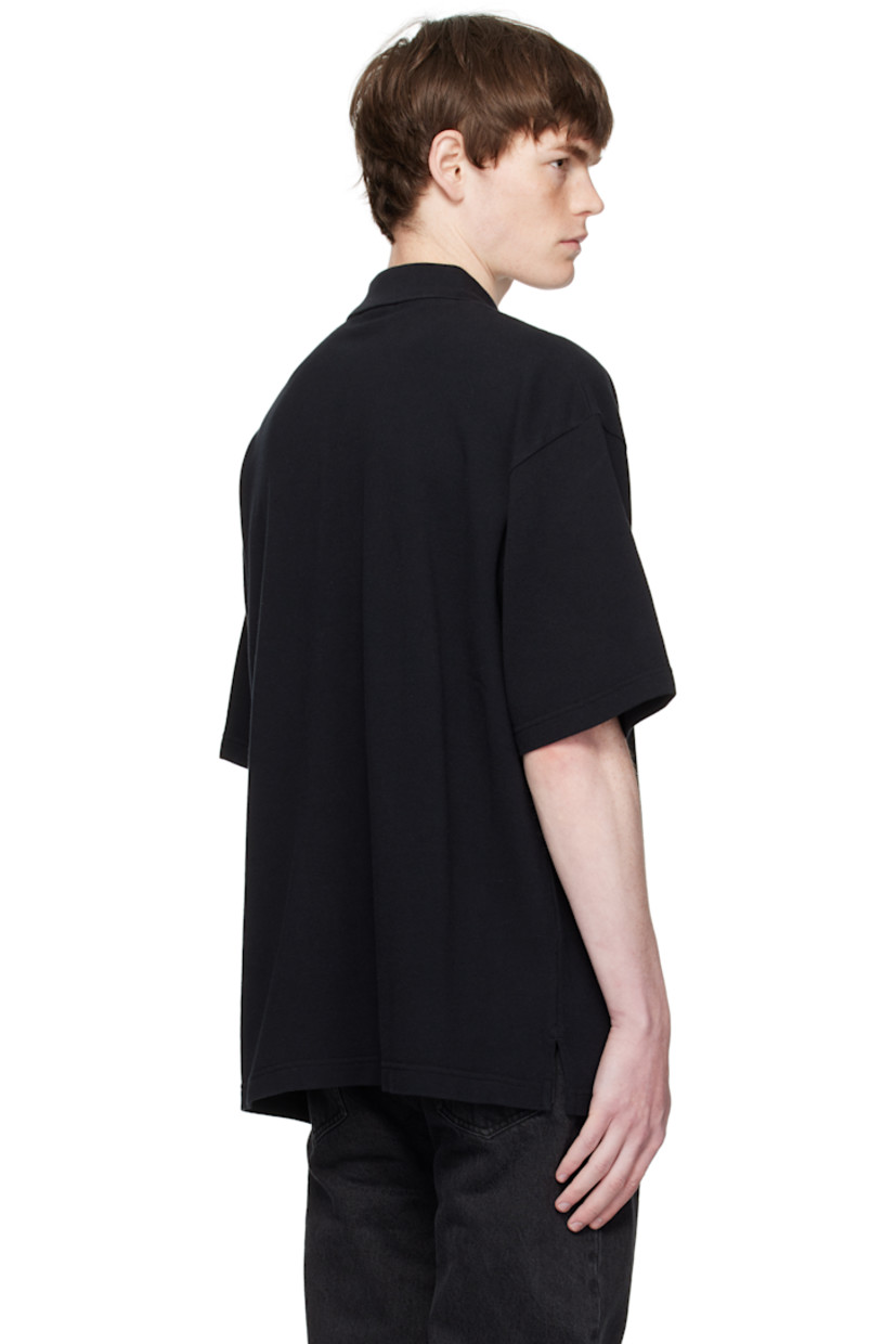 Cotton piqué polo.

· Rib-knit spread collar
· Three-button placket
· Logo patch embroidered at chest
· Tennis-tail hem

Supplier color: Black