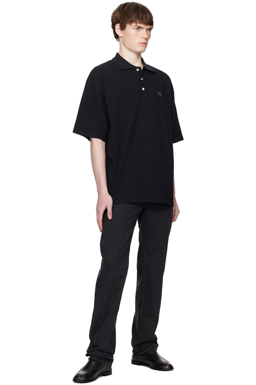 Cotton piqué polo.

· Rib-knit spread collar
· Three-button placket
· Logo patch embroidered at chest
· Tennis-tail hem

Supplier color: Black