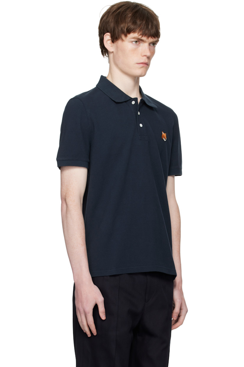 Cotton piqué polo

· Rib-knit spread collar
· Two-button placket
· Logo patch embroidered at chest
· Tennis-tail hem

Supplier color: Ink Blue