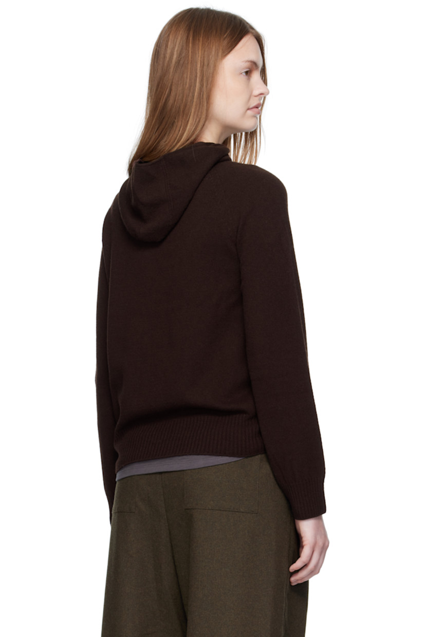 Brushed knit wool hoodie. 

· Logo hardware at front
· Rib-knit hem and cuffs
· Raglan sleeves

Supplier color: Leather