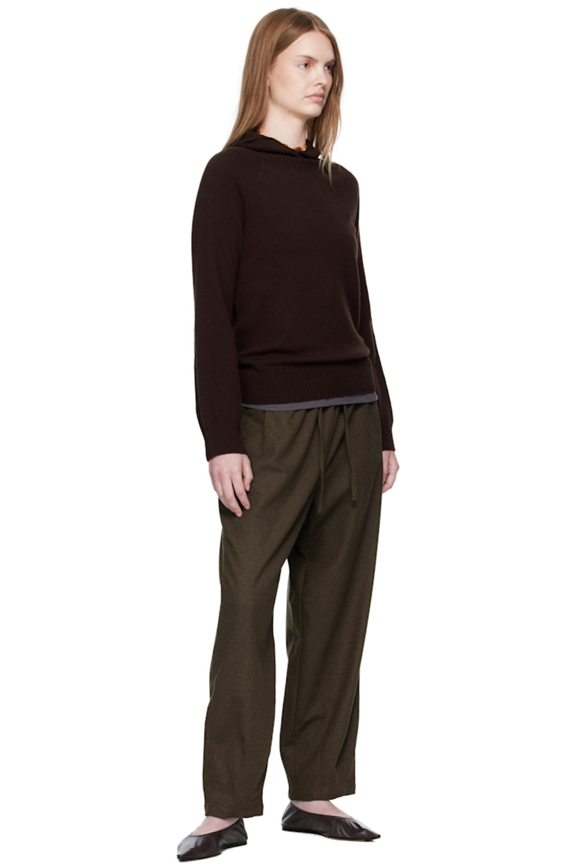 Brushed knit wool hoodie. 

· Logo hardware at front
· Rib-knit hem and cuffs
· Raglan sleeves

Supplier color: Leather