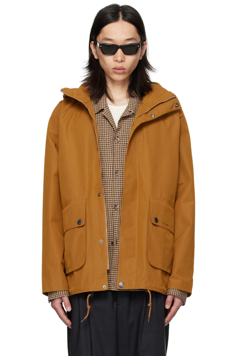 Coated canvas jacket.

· Waterproof
· Bungee-style drawstring at detachable hood
· Stand collar
· Two-way zip closure with press-stud placket
· Flap pockets and embroidered logo at front
· Cord-lock drawstring at hem
· Raglan sleeves
· Metal eyelets at underarms
· Adjustable button tab at cuffs
· Locker loop at back collar
· Patch pocket at interior
· Full satin and flannel lining

Supplier color: Bronze brown