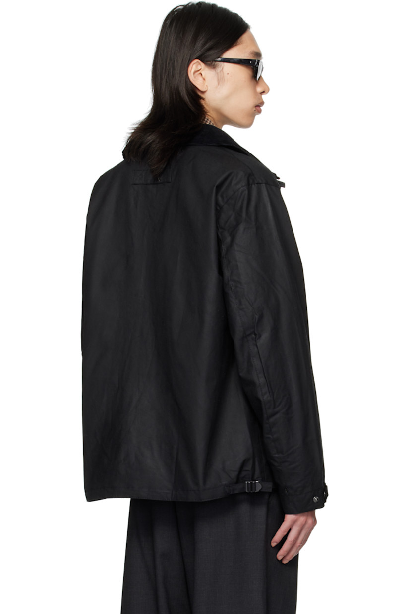 Waxed cotton canvas jacket. 

· Stand collar 
· Concealed two-way zip closure
· Press-stud placket 
· Flap pockets, D-ring, and logo embroidered at front
· Grommets at side seams
· Press-stud cuffs
· Cinch tabs at back hem 
· Patch pocket at interior 
· Partial twill lining

Supplier color: Black