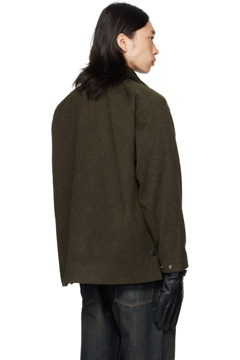 Wool-blend melton jacket.

· Press-stud throat guard at spread collar
· Zip closure with press-stud placket
· Welt pockets and flap pockets at front
· Logo embroidered at front
· Raglan sleeves
· Metal eyelets at underarms
· Press-stud fastening at cuffs
· Press-stud vents at back hem
· Patch pocket at interior
· Full flannel and satin lining

Supplier color: Olive