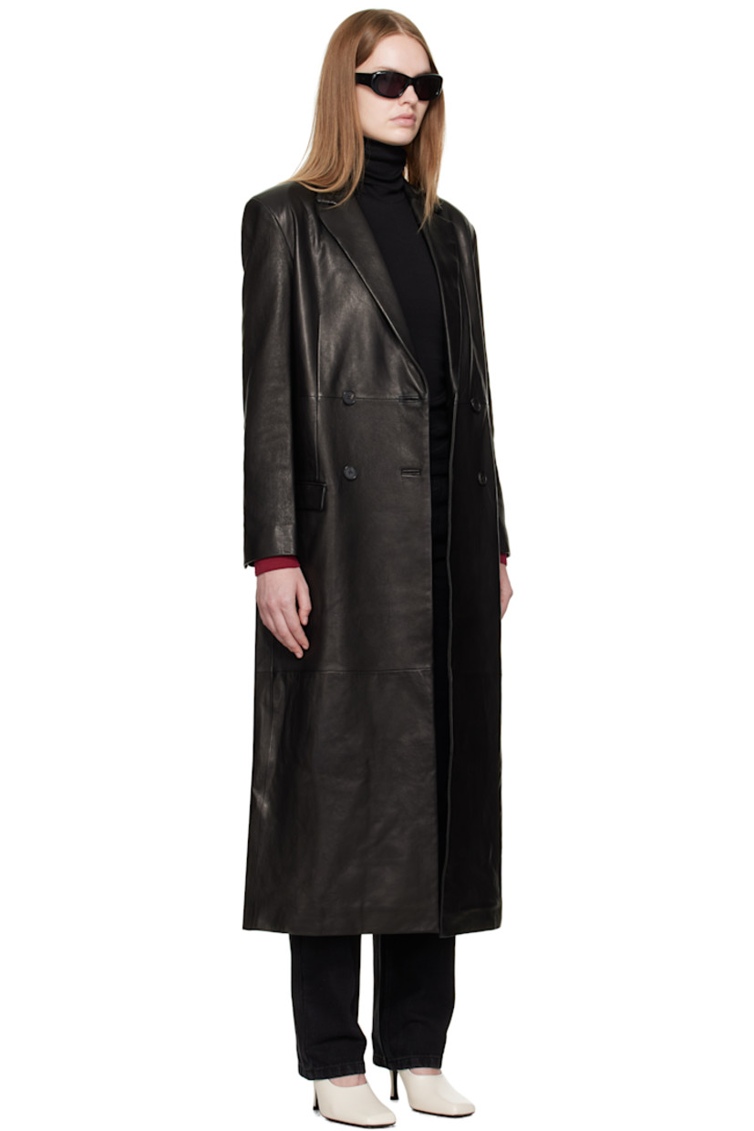 Grained lambskin coat.

· Notched lapel
· Double-breasted button closure
· Flap pockets at waist
· Padded shoulders
· Surgeon's cuffs
· Central vent at back hem
· Full satin lining
· Logo-engraved horn hardware

Supplier color: Black