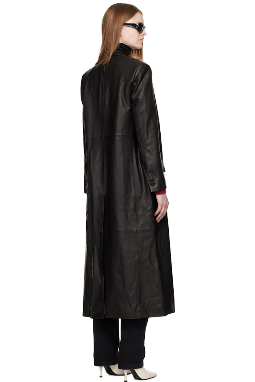 Grained lambskin coat.

· Notched lapel
· Double-breasted button closure
· Flap pockets at waist
· Padded shoulders
· Surgeon's cuffs
· Central vent at back hem
· Full satin lining
· Logo-engraved horn hardware

Supplier color: Black