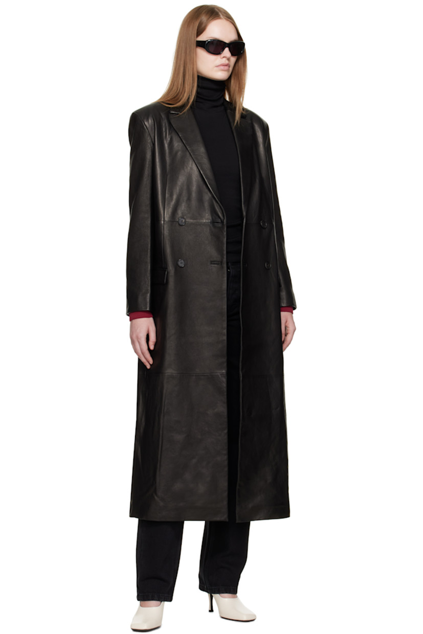 Grained lambskin coat.

· Notched lapel
· Double-breasted button closure
· Flap pockets at waist
· Padded shoulders
· Surgeon's cuffs
· Central vent at back hem
· Full satin lining
· Logo-engraved horn hardware

Supplier color: Black