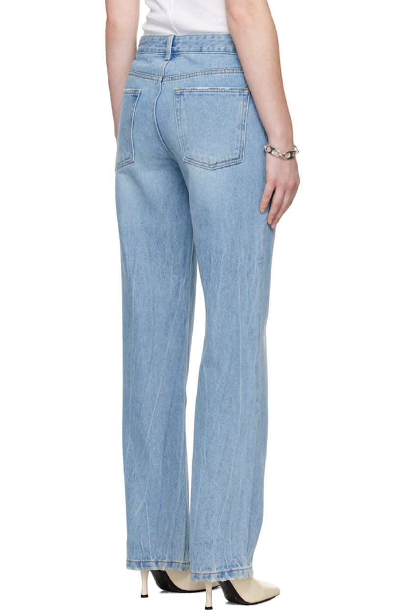 Straight-leg non-stretch denim jeans.

· Fading, whiskering, and subtle distressing throughout
· Belt loops
· Five-pocket styling
· Button fly
· Logo-engraved silver- and copper-tone hardware
· Contrast stitching in tan

Supplier color: Washed blue