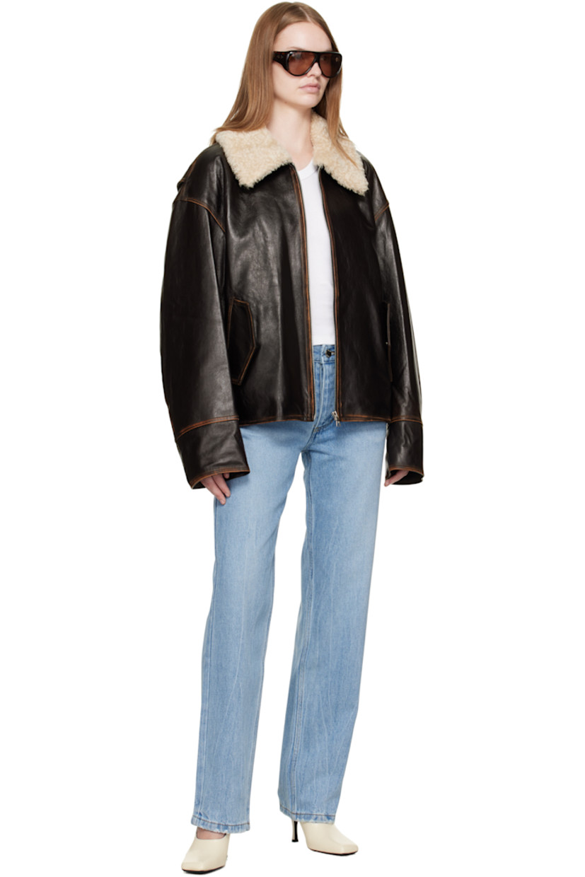 Straight-leg non-stretch denim jeans.

· Fading, whiskering, and subtle distressing throughout
· Belt loops
· Five-pocket styling
· Button fly
· Logo-engraved silver- and copper-tone hardware
· Contrast stitching in tan

Supplier color: Washed blue