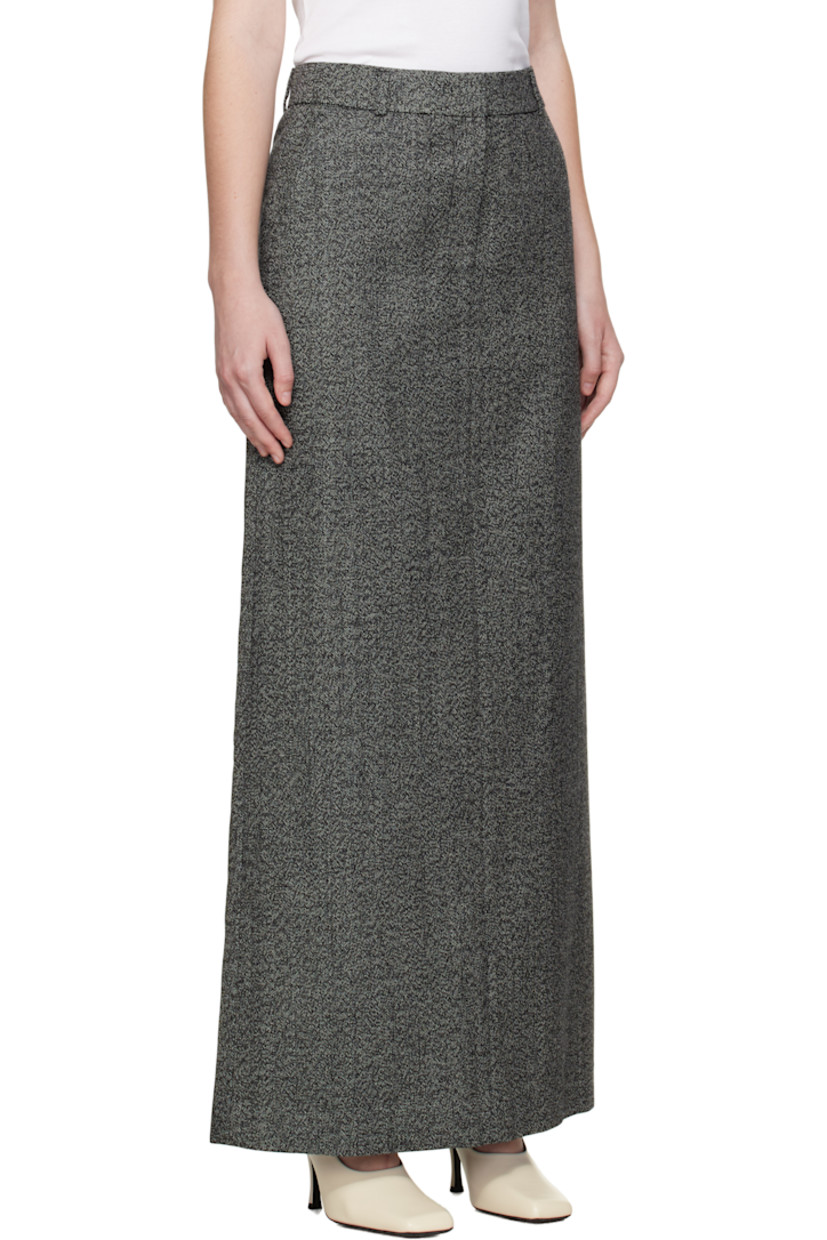 Wool tweed maxi skirt.

· Belt loops
· Two-pocket styling
· Zip fly
· Central vent at back hem
· Full satin lining

Supplier color: Gray
