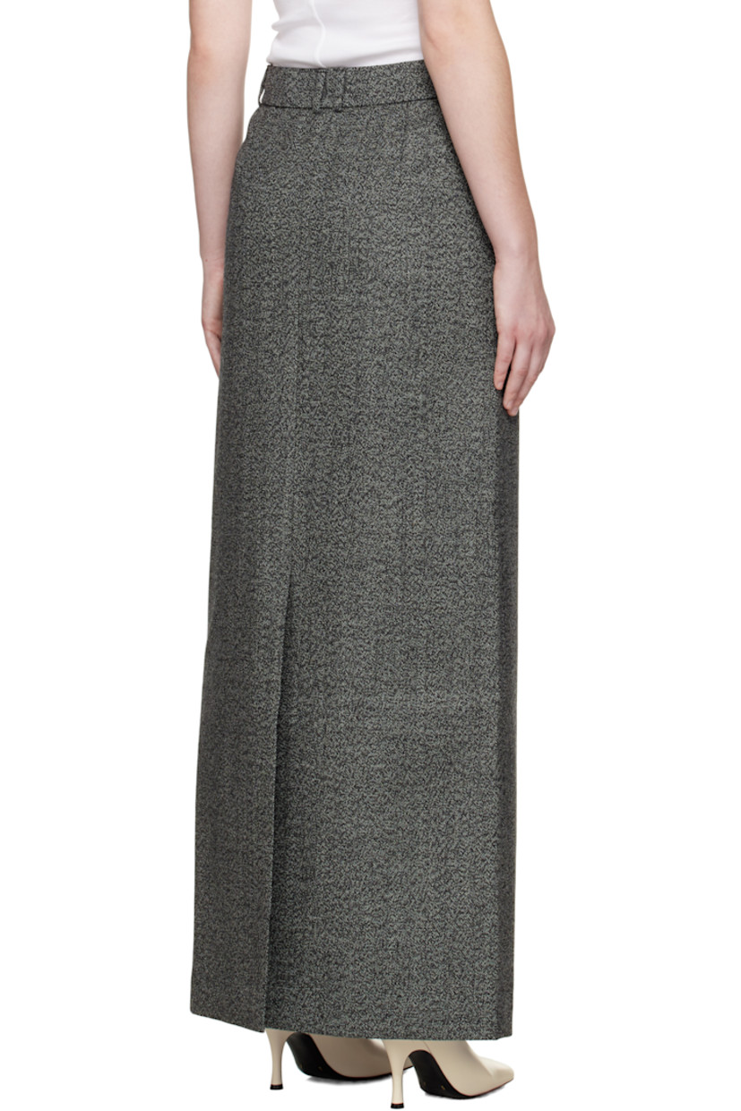 Wool tweed maxi skirt.

· Belt loops
· Two-pocket styling
· Zip fly
· Central vent at back hem
· Full satin lining

Supplier color: Gray