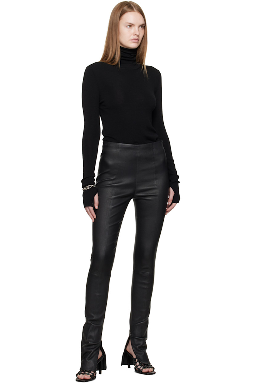 Knit wool- and cashmere-blend turtleneck.

· Rolled collar
· Thumbhole at cuffs

Supplier color: Black