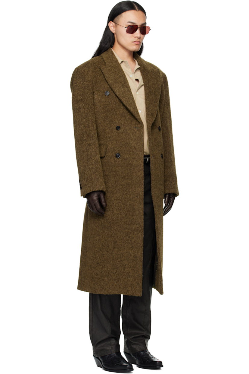 Shag-knit wool- and suri alpaca-blend coat. 

· Peaked lapel 
· Double-breasted button closure
· Flap pockets at waist
· Buttoned surgeon's cuffs
· Central vent at back hem
· Welt pocket at interior 
· Full satin lining 

Supplier color: Khaki